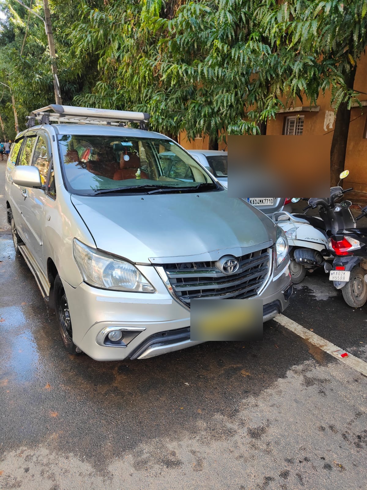 Silver Toyota Innova SUV